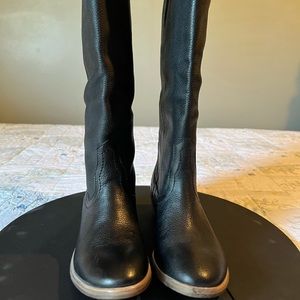 Knee high black leather boots